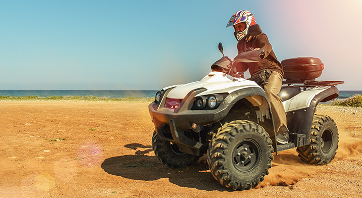 Half an hour riding a quad bikes on the beach