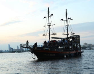 Black Pearl Pirate boat sightseeing cruise in the Dubai Creek Harbour for an hour.